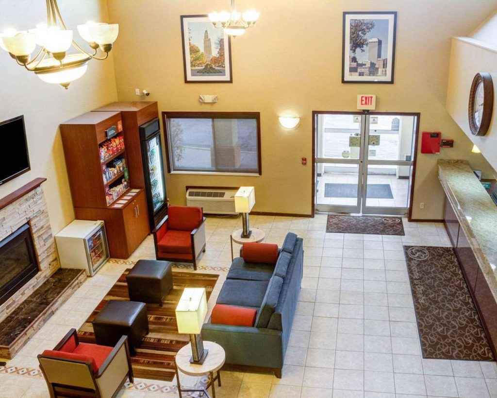 lobby-with-fireplace Comfort Suites by Choice Hotels