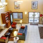 lobby-with-fireplace Comfort Suites by Choice Hotels